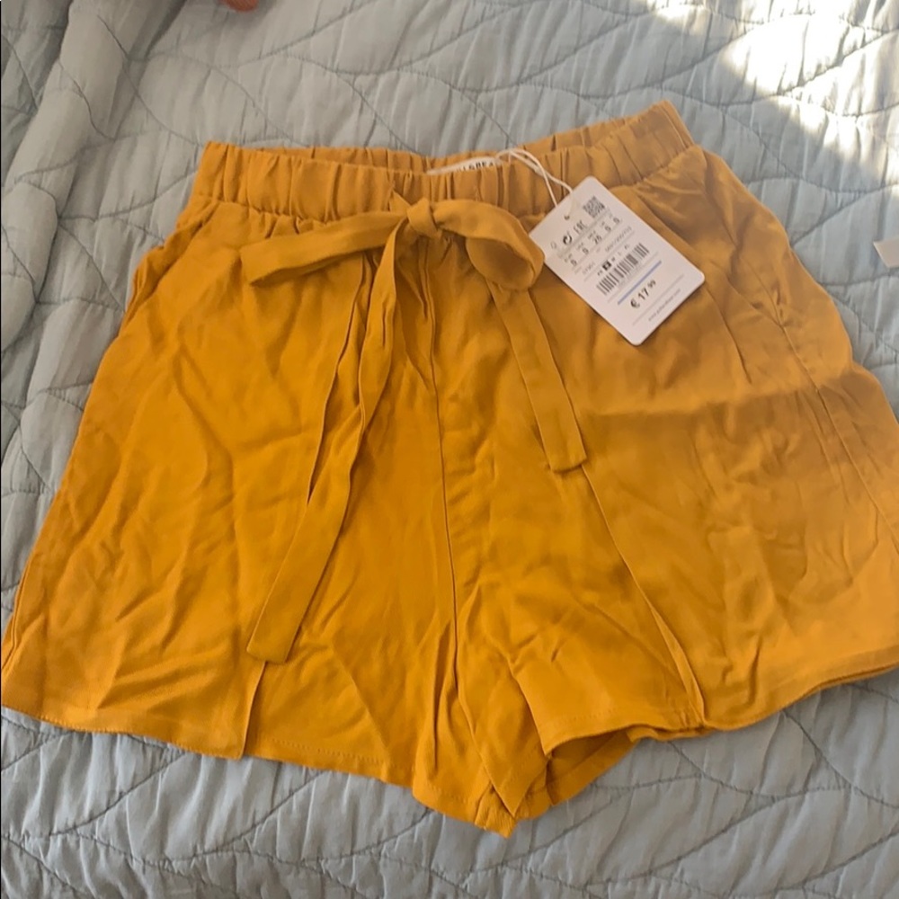 Golden/burnt orange flowy high waisted shorts